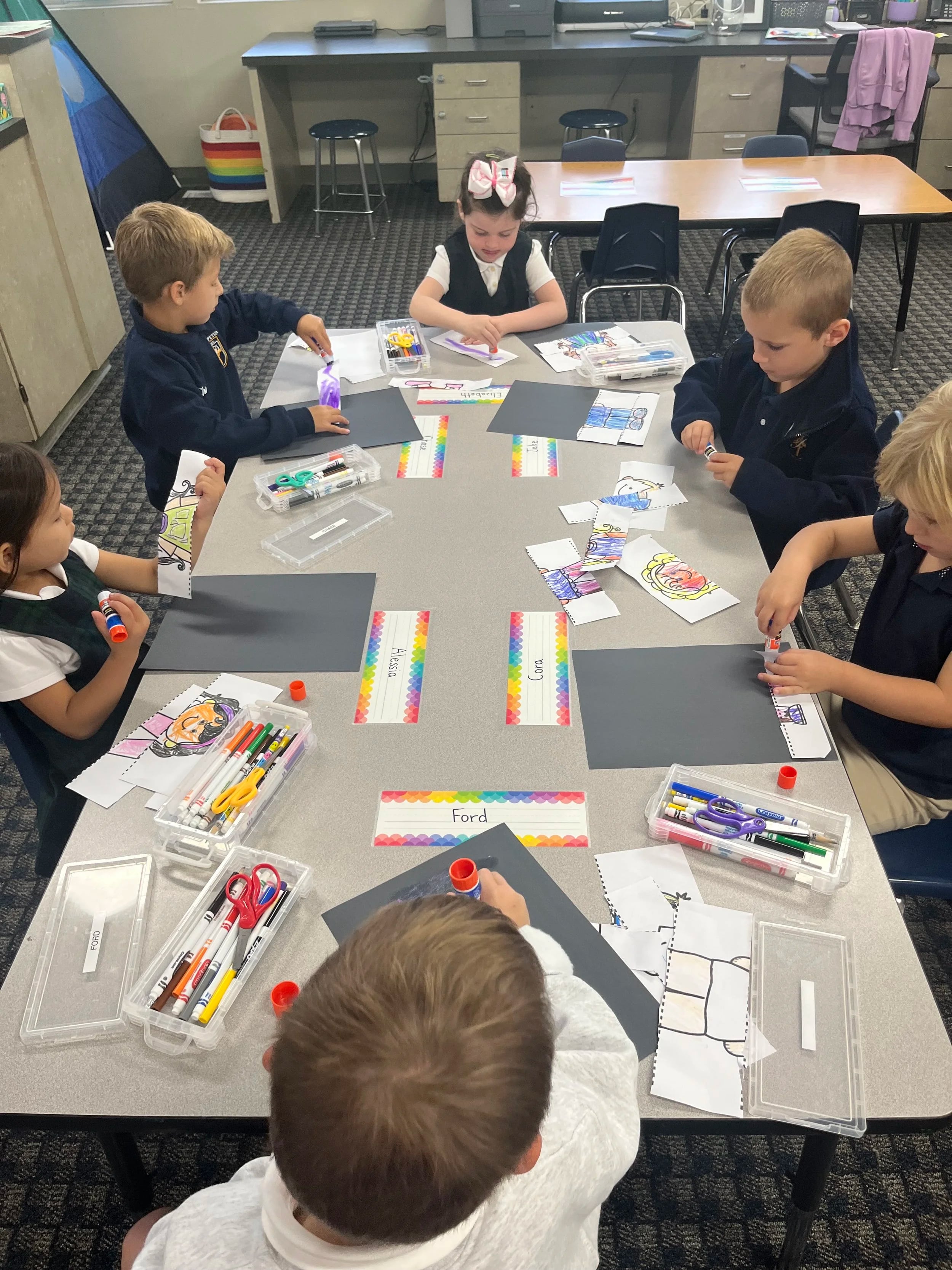 Elementary students collaborating on a project